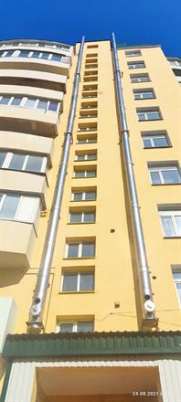 Коллективный коаксиальный дымоход из нержавеющей стали — фото с объекта